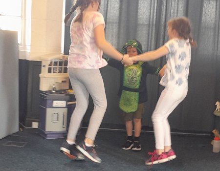 Dancing and singing at Monkey Puzzle Glasgow Afterschool Club